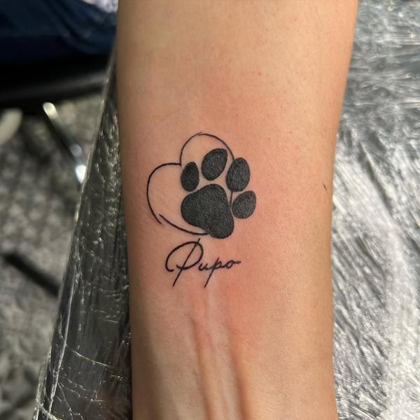 Fine line paw print tattoo by @mikotattoo