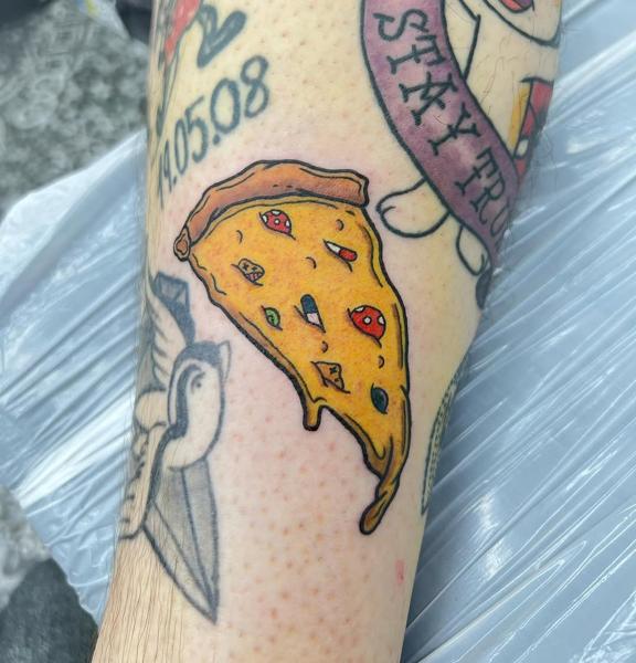 Traditional pizza slice tattoo by @mikotattoo