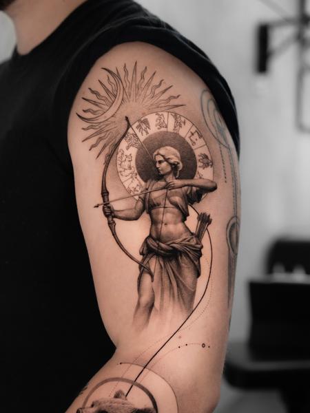 Realism archer goddess tattoo by @minaltt
