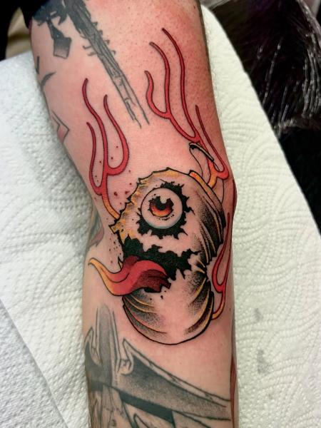 Traditional flaming eyeball tattoo by @mitchmicallef