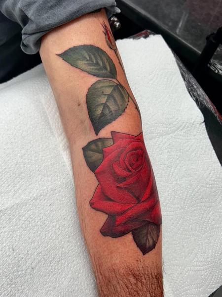 Traditional red rose tattoo by @mitchmicallef