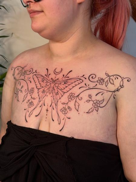 Fine line moth and floral tattoo by @moz.tattoos