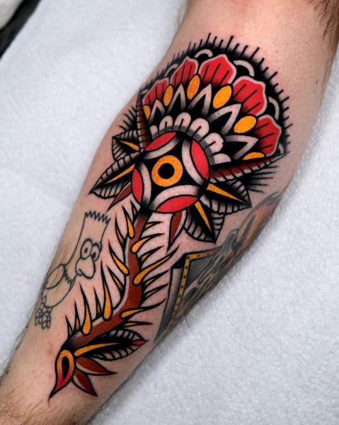 Traditional traditional flower tattoo by @morstattoo