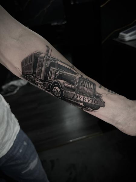 Black and grey realism semi truck tattoo by @mortenstubbe_tattoos