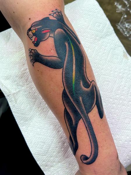 Traditional black panther tattoo by @mykechambers
