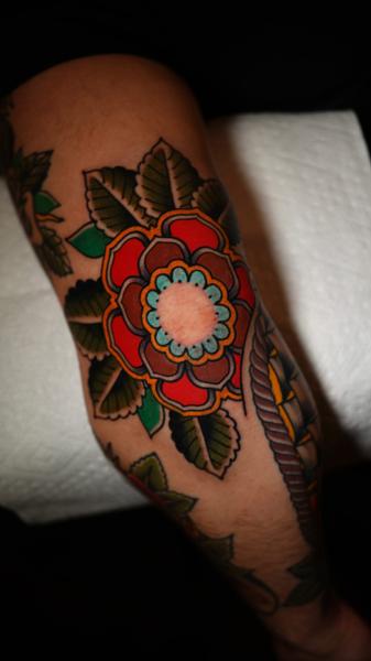 Traditional traditional flower tattoo by @mykechambers