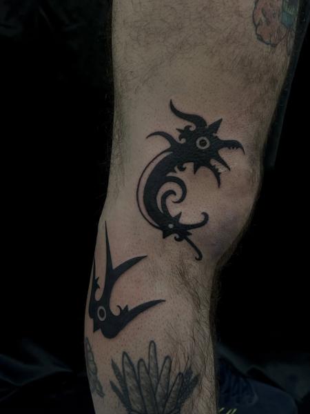 Tribal tribal dragon tattoo by @nako_tattoo
