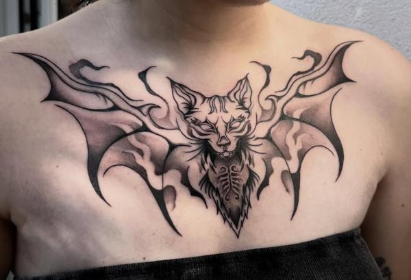 Blackwork bat cat tattoo by @psi.xi.tatt