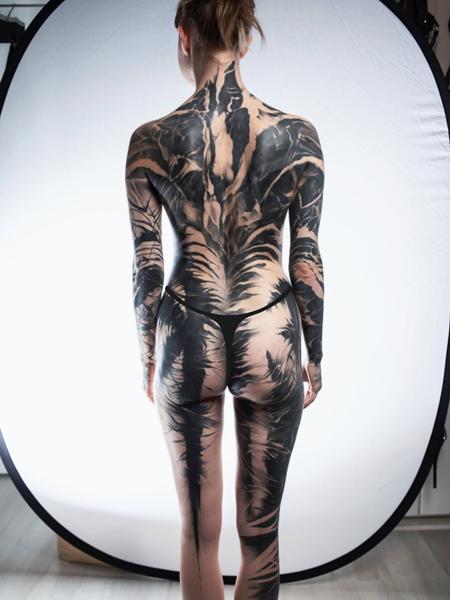 Blackwork abstract full body tattoo by @natalienox