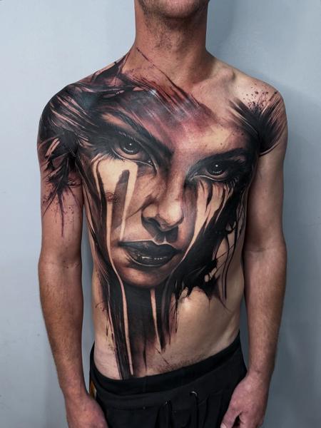 Realism dramatic face tattoo by @natalienox