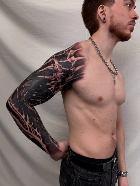Blackwork abstract sleeve tattoo by @natalienox