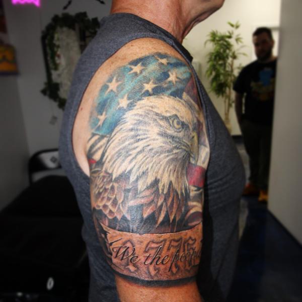 Realism eagle and flag tattoo by @necro_comicon