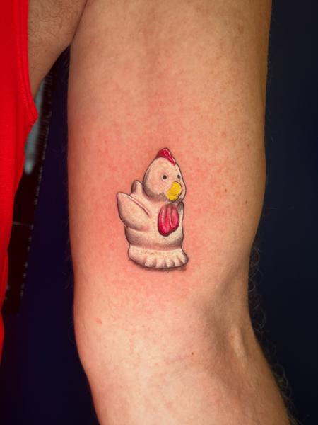 Realism chicken toy tattoo by @necro_comicon