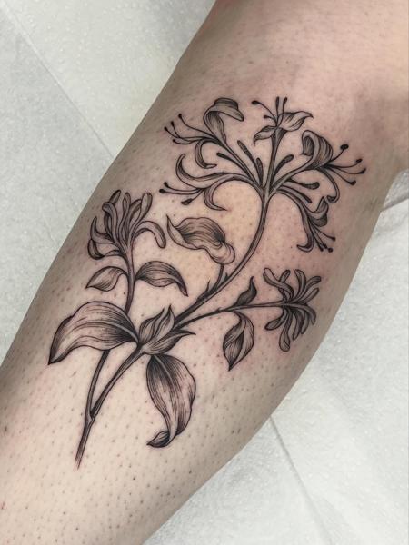 Fine line floral branch tattoo by @nel.does.tats