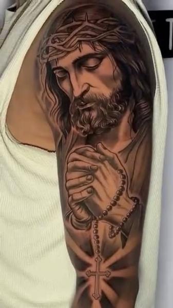 Realism praying jesus tattoo by @nettovasconcelostattoo