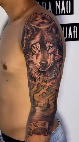 Realism wolf landscape tattoo by @nettovasconcelostattoo