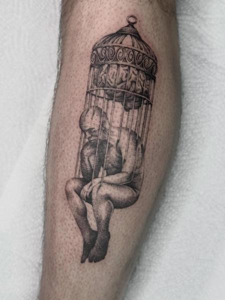 Dotwork caged figure brain tattoo by @ayp.nia