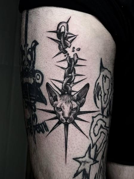 Blackwork spiked cat chain tattoo by @ayp.nia