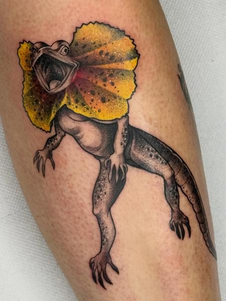 Illustrative frilled lizard tattoo by @ayp.nia
