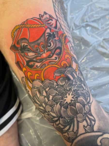 Japanese daruma doll tattoo by @nickfarbeyond