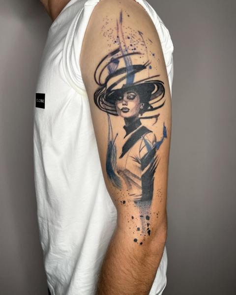 Illustrative woman in hat tattoo by @nick_theocharis