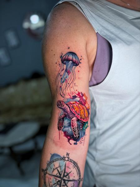 Watercolor jellyfish turtle tattoo by @nick_theocharis
