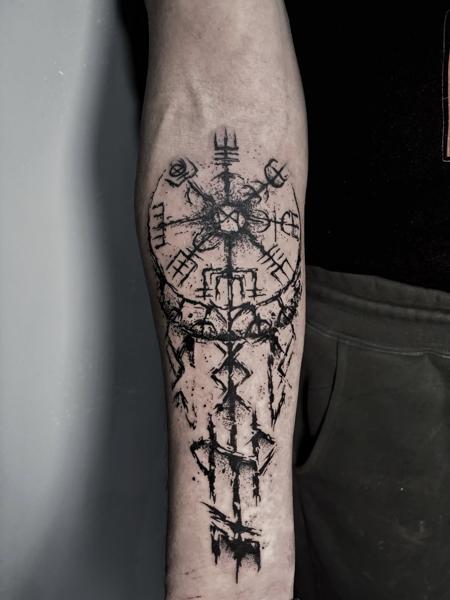 Blackwork abstract symbol tattoo by @nick_theocharis