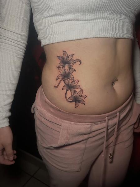 Fine line floral design tattoo by @mrduke__inkaholic