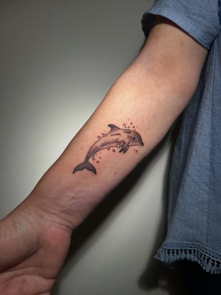 Fine line dolphin tattoo by @mrduke__inkaholic