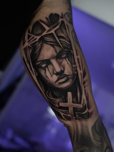 Realism crying statue tattoo by @nikoselmaidis_tattoo