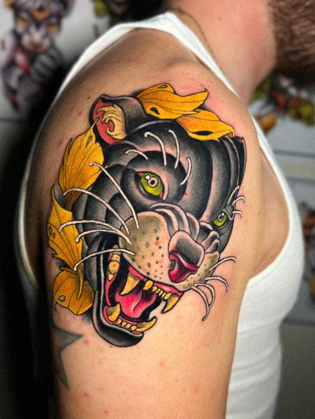Traditional panther head tattoo by @peri_tattoo_
