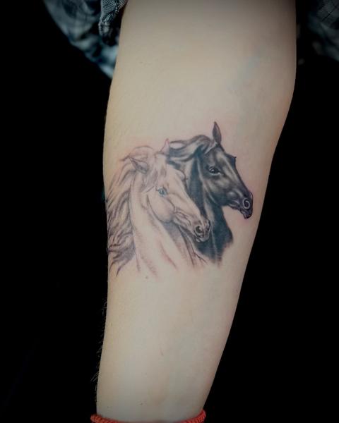 Realism horse heads tattoo by @nikosrodis
