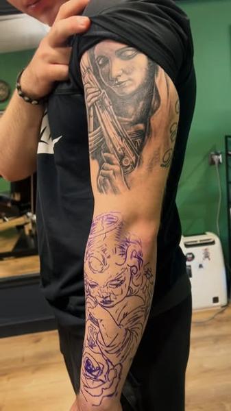 Realism woman with gun tattoo by @nikosrodis