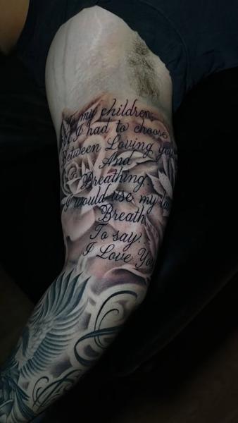 Realism script roses tattoo by @nmrebel