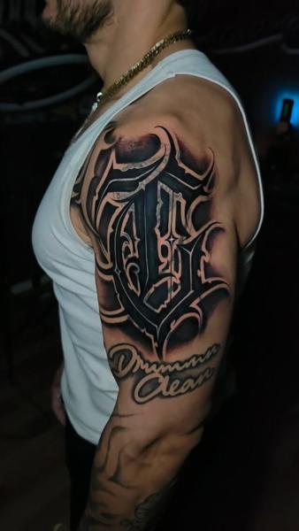 Blackwork lettering tattoo by @nmrebel