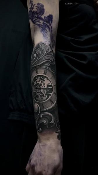 Realism ornate clock tattoo by @noemikovacstattoo