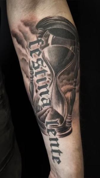 Black and grey realism hourglass text clouds tattoo by @oleg_narvski