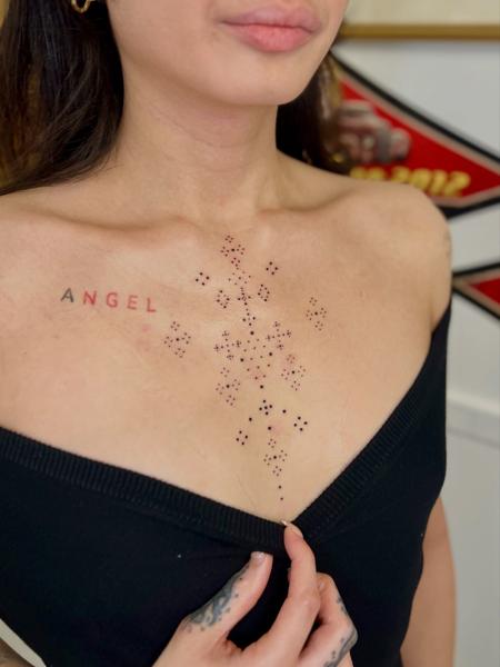 Dotwork braille text tattoo by @olgabanas