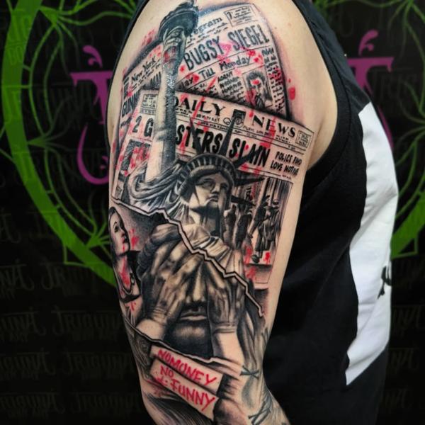 Realism statue of liberty tattoo by @outcast.tattoo.budapest