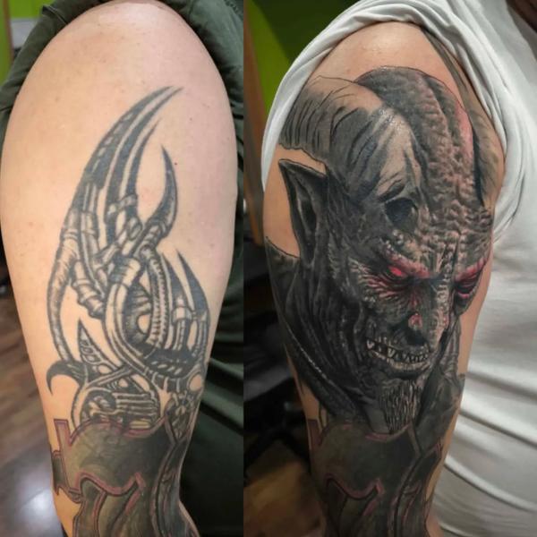 Realism demonic face tattoo by @outcast.tattoo.budapest