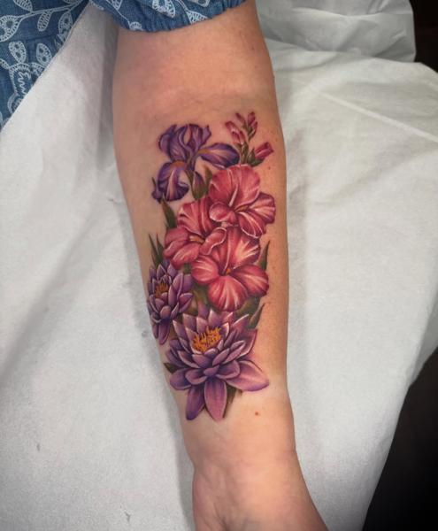 Realism floral bouquet tattoo by @paigehutchinson_tattoo