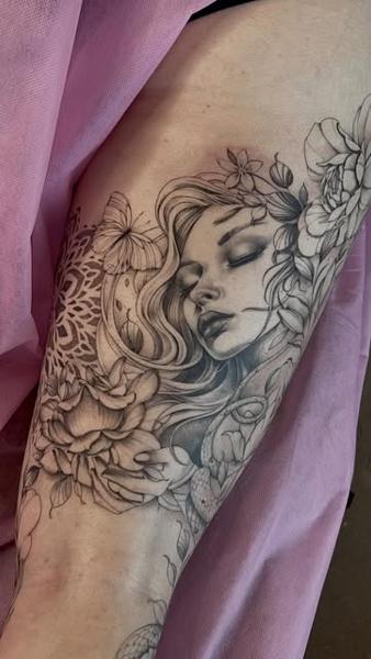 Illustrative neo-traditional woman tattoo by @tattoopaiges