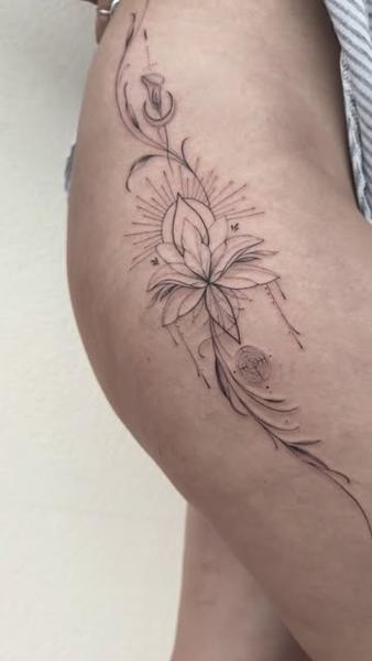 Fine line ornamental lotus tattoo by @tattoopaiges