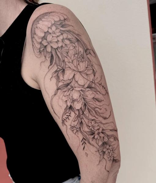 Fine line floral jellyfish tattoo by @tattoopaiges