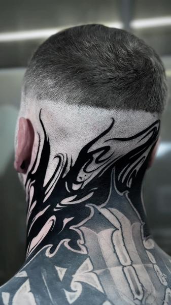 Blackwork abstract flames tattoo by @pain4pleasure.tattoo