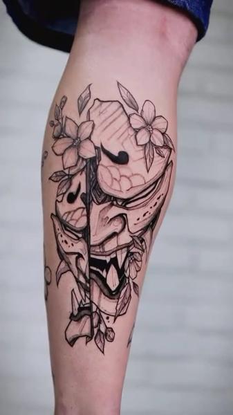 Japanese floral oni mask tattoo by @kristeake.tattoo
