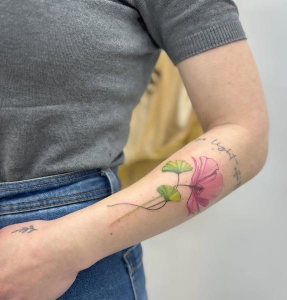 Realism pink flower tattoo by @kristeake.tattoo