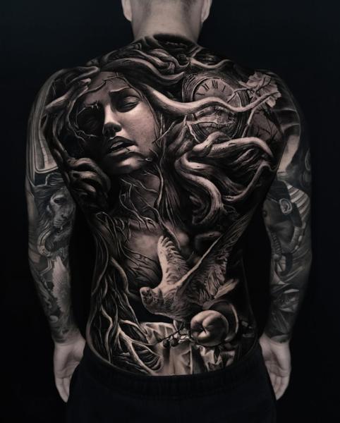 Realism woman with branches tattoo by @dast.one