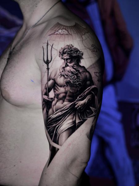 Realism poseidon tattoo by @dast.one