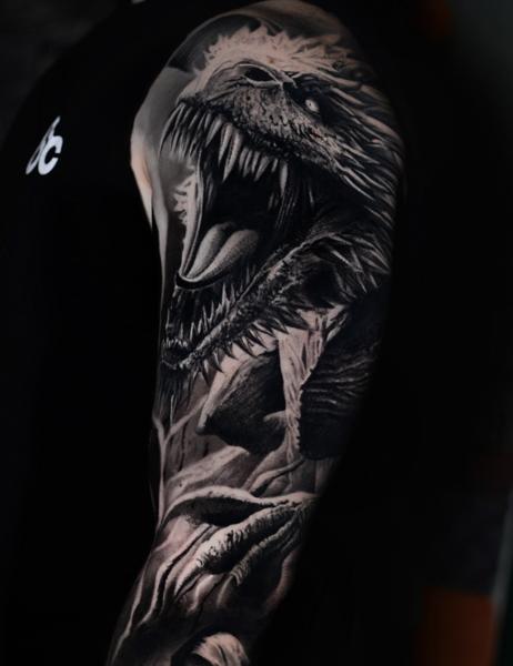 Realism dinosaur tattoo by @dast.one
